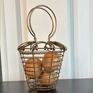 Antique wire egg basket.